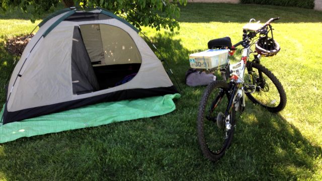 Bouncing Betty in front of tent.