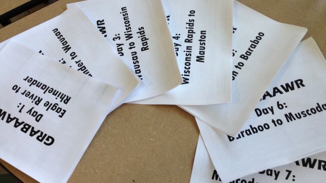 The cue sheets spread out on the table.