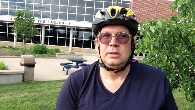 Paul in front of school.