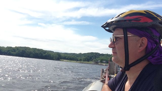 Paul looking at the river from the ferry.