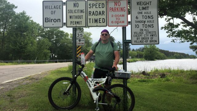 Paul and bike in Biron