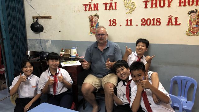Paul and 5 elementary school students.