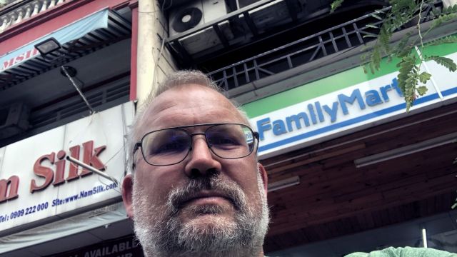 Paul in front of Family Mart in Ho Chi Minh City.