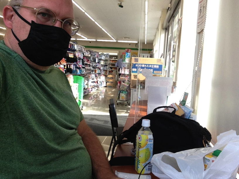 Paul chilling out at a convenience store.