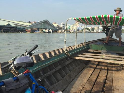 man on sampan boat