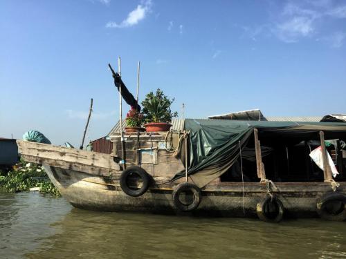 Boat on Sông Hậu River.