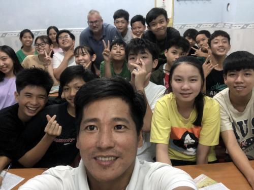 David and Paul with junior high school English class.