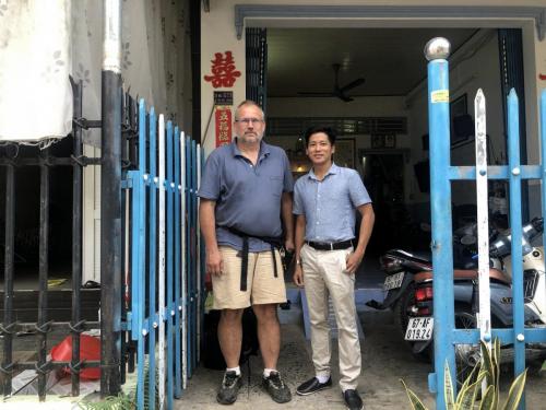 Paul and David in front of David's house.